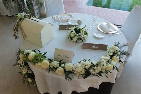 Bouquet sposa e centrotavola matrimonio