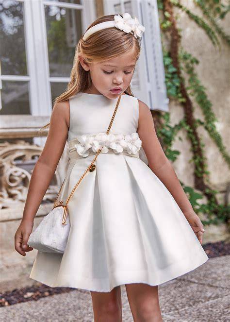 Accessori eleganti per battesimo bambina