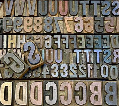 Caratteri mobili metallici e pressa tipografica