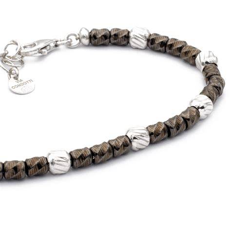 Materiali bracciali preghiera pelle acciaio argento