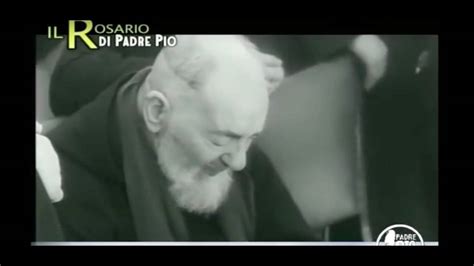 Padre Pio con rosario e luce